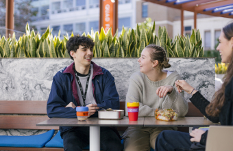 Students enjoying lunch in reusable boxes